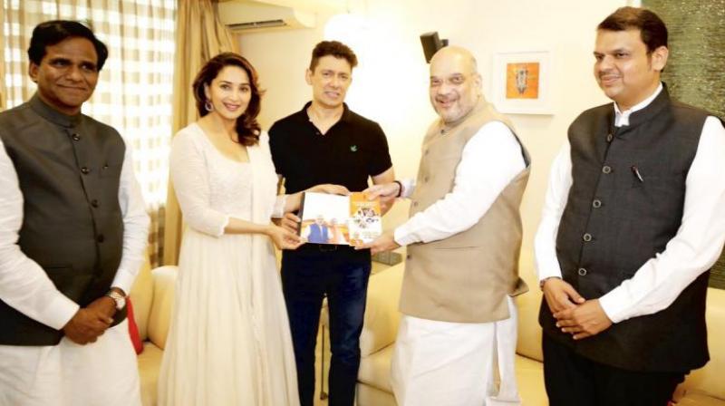 51-year-old actor, Madhuri Dixit has featured in many Bollywood films, including Hum Aapke Hain Koun..!, Dil To Pagal Hai, Saajan and Devdas. (Photo: Twitter | @AmitShah)