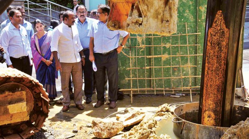 Mayor Sampath Raj and BBMP officials inspect Metro work during the Bengaluru city rounds, in Bengaluru on Monday