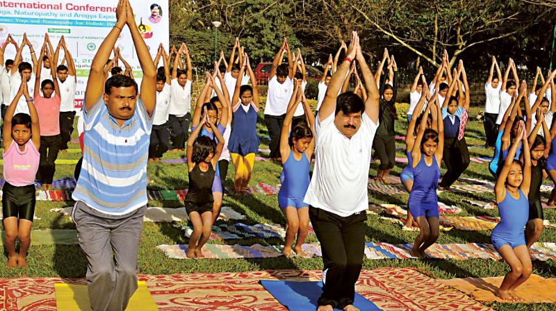 A file photo of former minister and BJP leader S.A. Ramdas at  a yoga session. (Photo: DC)