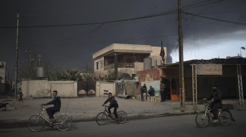 A 100,000-strong alliance of Iraqi forces, backed by US-led coalition air strikes, have retaken several districts just north of Intisar district of Mosul. 	 (Photo: AP)