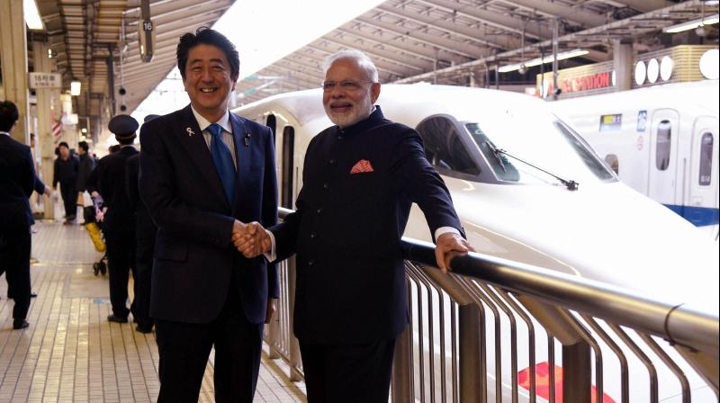 Prime Minister Narendra Modi and his Japanese counterpart Shinzo Abe in Tokyo, Japan. (Photo: PTI)