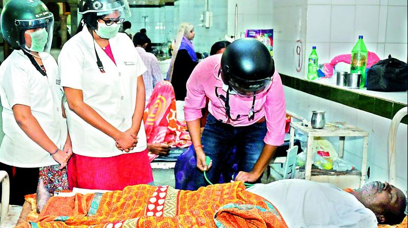 Hyderabad: Doctors don helmets over safety concerns at Osmania General Hospital