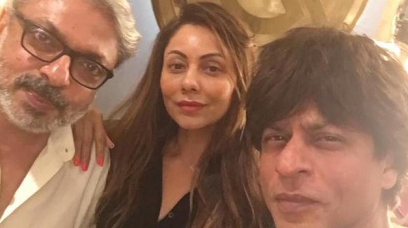 Sanjay Leela Bhansali, Gauri and Shah Rukh Khan pose for a selfie.