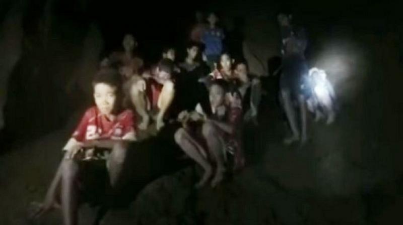 The players remain trapped despite being reached this week by cave-diving rescuers, who released footage of them looking emaciated but calm, some wearing football shirts. (Photo: ANI)
