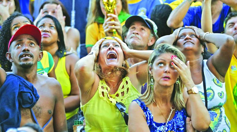 Brazil fans look crestfallen. (Photo: AP)