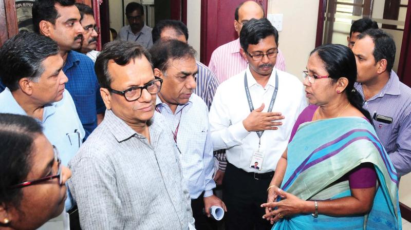 Experts from National Center for Disease Control (NCDC), New Delhi have a word with Health Minister K.K.Shylaja before the Nipah high-level meet in Kozhikode on Monday. (Photo: Venugopal)