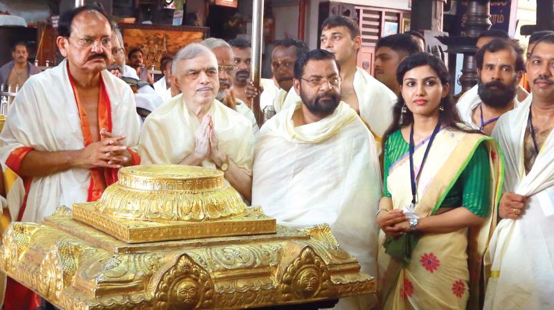 Vice-President M. Venkaiah Naidu visits Guruvayur Sri Krishna Temple on Monday. Governor P. Sathasivam and Devaswom Minister Kadakampalli Surendran are also seen. (Photo: Anup K. Venu)