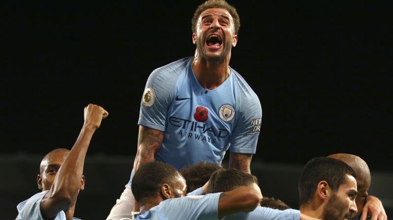 Defending champions Manchester City stayed two points clear at the top following their dominant 3-1 win against Manchester United. (Photo: AP)