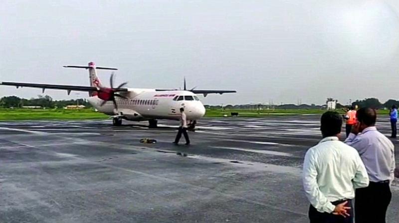 The first flight -- an Alliance Air ATR plane -- landed on Monday morning at INS Garuda Kochi Naval Air Station. (Photo: Twitter | ANI)