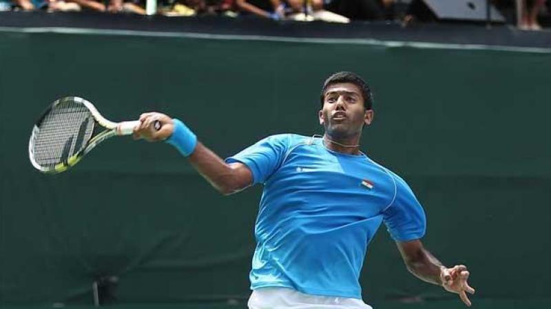 Despite some amazing bits of play, Rohan Bopanna and Purav Raja could not come up with the goods against Vasek Pospisil and Daniel Nestor of Canada. (Photo: AFP)
