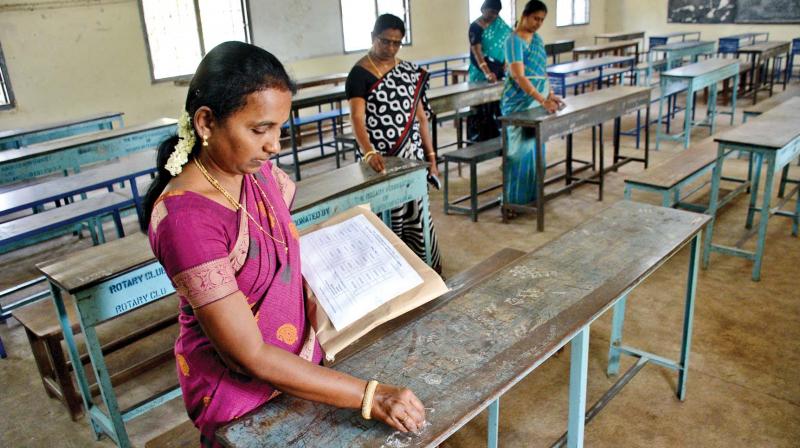 Teachers of Presidency Higher Secondary School For Girls in Egmore mark roll number for plus-2 examinations beginning on Thursday.  	DC