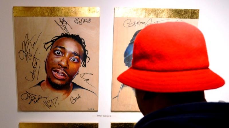 Grandmaster Caz looks at a portrait of late rapper Ol Dirty Bastard of the Wu-Tang Clan at the hip-hop pop-up museum. (Photo: AFP)