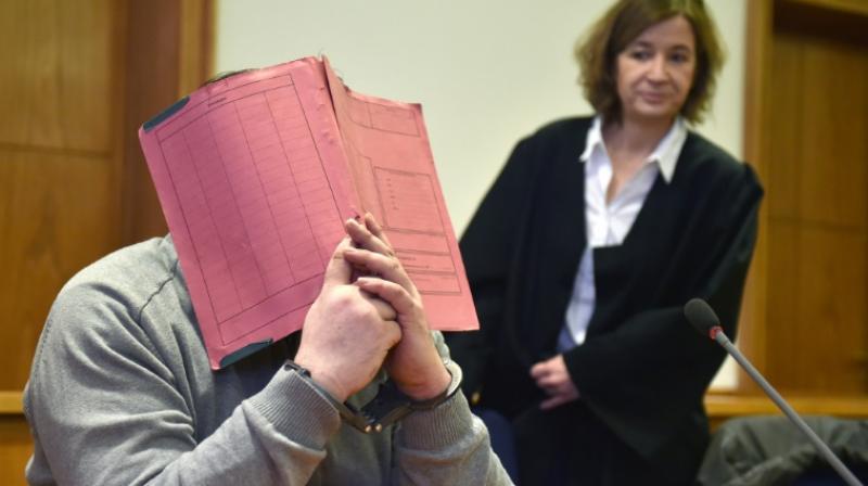 German former nurse Niels Hoegel (L) is accused of killing more than 100 patients in his care. (Photo: AFP)