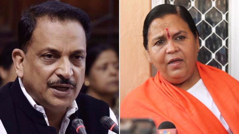 Uma Bharti and Rajiv Pratap Rudy were among four ministers who resigned from the Cabinet on Thursday. (Photos: PTI)