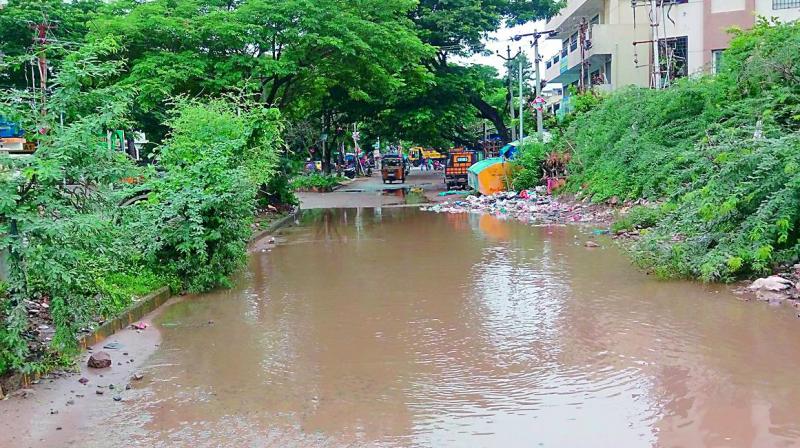 A resident (@venubababorra) while highlighting the plight of the city on social media tweeted this photograph. He wrote,  Dear @CommissionrGHMC, @GHMCOnline, these pics are frm Golkonda-Manikonda road. Does it come under GHMC or how to get in touch with respective teams.