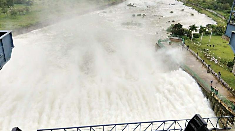 Water being released from Hemavathy Dam in Hassan on Saturday.