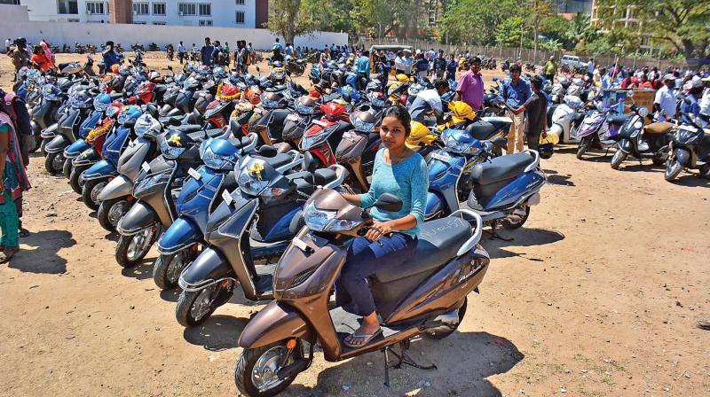 Narendra Modi will launch the ambitious Amma two-wheeler scheme that envisages providing 50 per cent subsidy to 1 lakh working women every year to buy mopeds  a key promise made by late J. Jayalalithaa in the 2016 elections  on Saturday here.