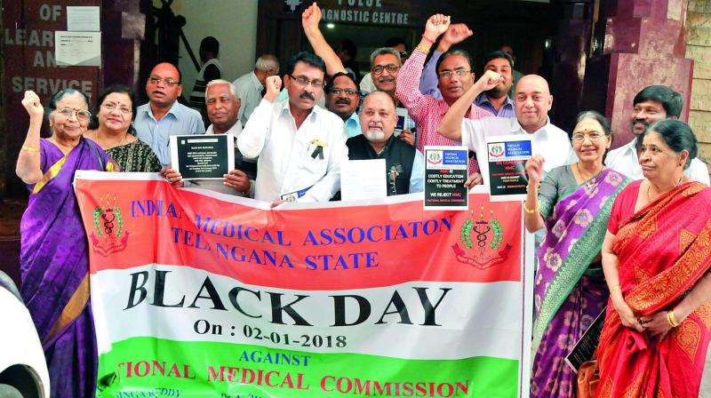 Doctors of the Indian medical association, protesting against the proposed NMC  Bill on black day at IMA building, Esamia Bazar, Koti, in Hyderabad on Tuesday. (Photo: DC)