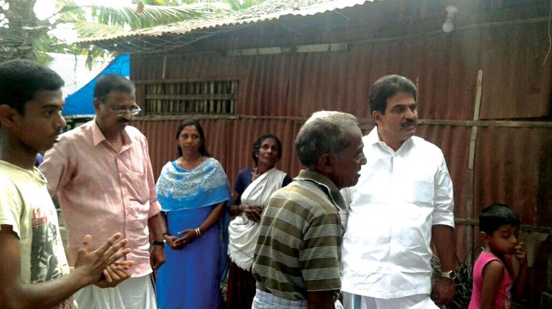 Amal Gopi with grandfather P. Gopi and K.C. Venugopal