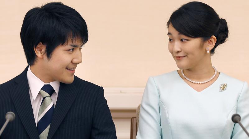 Japanese Emperor Akihitos oldest grandchild, Princess Mako, says she is getting married to her university classmate who won her heart with bright smiles and sincerity. (Photo: AP)