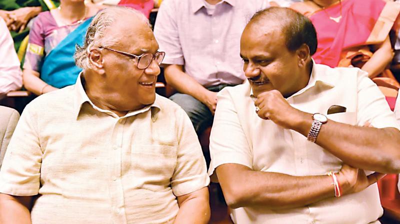 CM H.D. Kumaraswamy greets Chairman of the Vision Group on Science and Technology, CNR Rao on the occasion of  Sir M Visvesvaraya, Dr Raja Ramanna, Sir CV Raman, Prof. Satish Dhawan and Dr Kalpana Chawla State awards for scientists and engineers at JN Tata Auditorium, IISc in Bengaluru on Monday