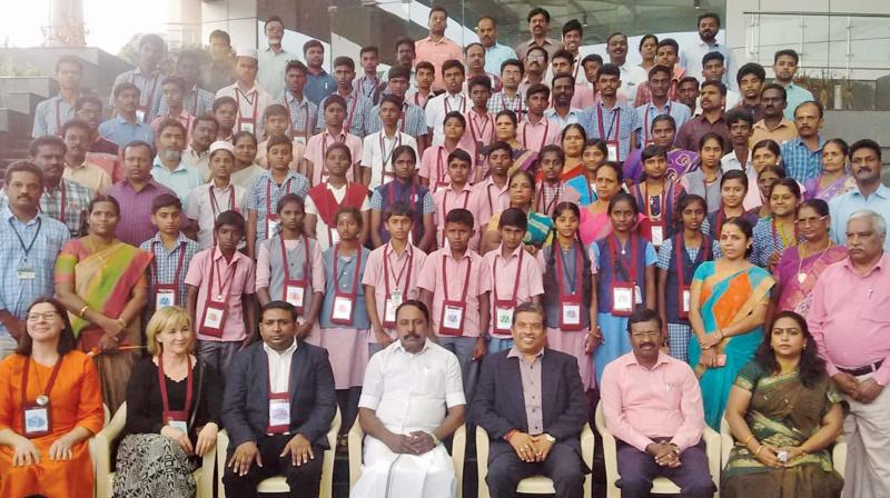 School  education  minister K. A. Sengottaiyan and officials with young  scientists from government schools who were selected to travel to Finland and Sweden (Photo: DC)