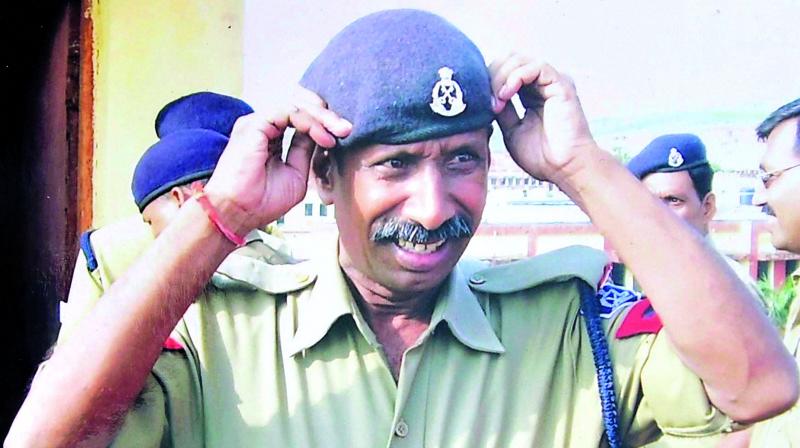 A file photo of Bhopal Central Jail head constable Ramashankar who was killed by the eight Simi terrorists during their escape from prison on October 31. (Photo: PTI)