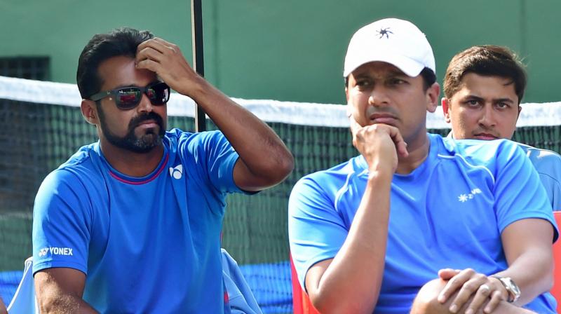 Leander Paes and Mahesh Bhupathihave a 303-103 career record together with a Davis Cup record of longest winning streak in doubles, with 23 straight victories. (Photo: PTI)