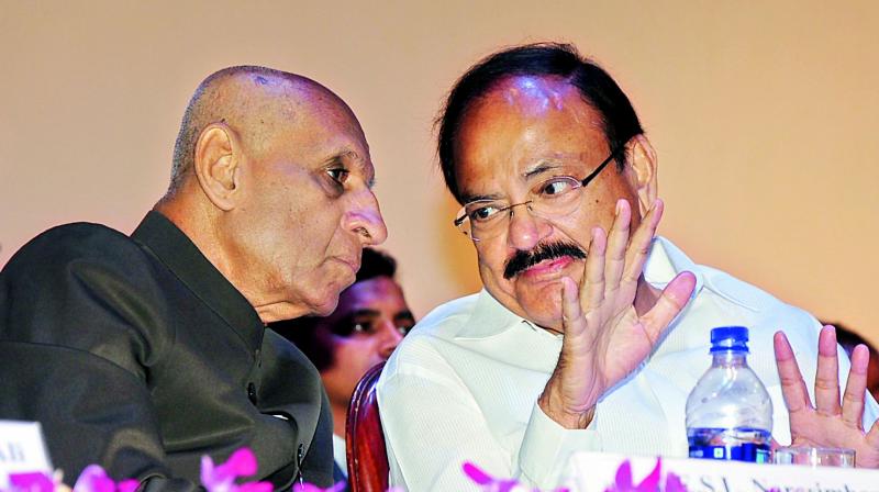 Vice-President M. Venkaiah Naidu and Governor E.S.L. Narasimhan  at the inaugural ceremony of the 78th session of the Institute of International law at NALSAR University on Sunday.  	(Photo:DC)
