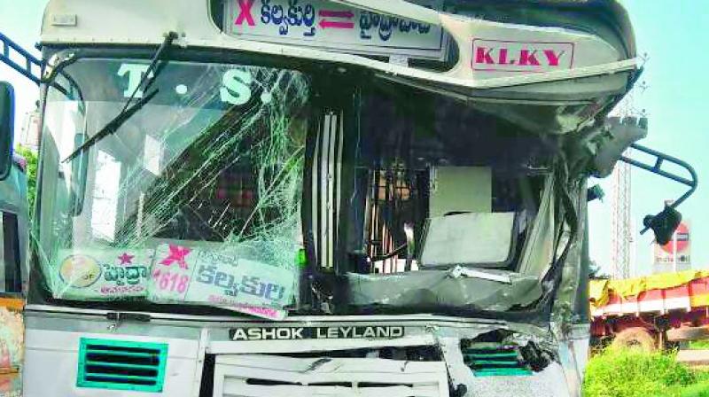 The mangled body of the bus which was hit by a truck on Srisailam Highway on Saturday night . (Photo:DC)