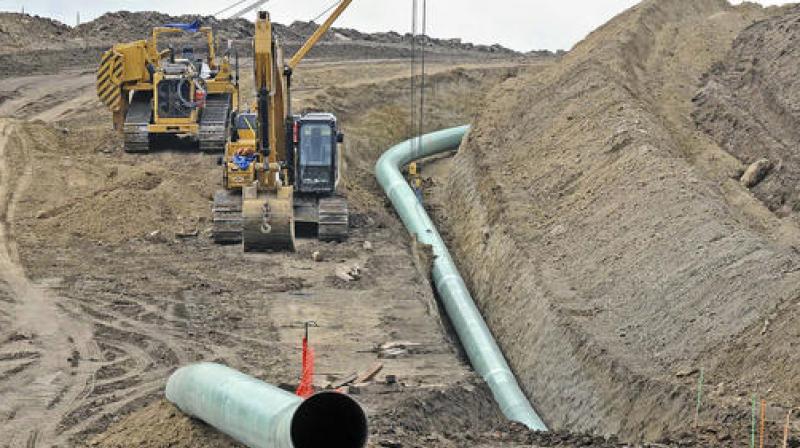 The 1,200-mile pipeline would carry North Dakota oil through the Dakotas and Iowa to a shipping point in Illinois. (Photo: AP)