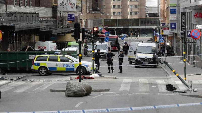 A street is cordoned off near the department store Ahlens following Fridays suspected terror attack in central Stockholm, Sweden. (Photo: AP)