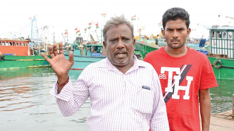 Kalaiarasu and his son Arun Kumar. (Photo: DC)