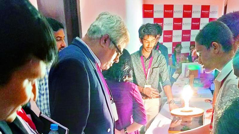 Students conduct experiments at the newly-launched Science Experience Centre in Hyderabad on Tuesday.