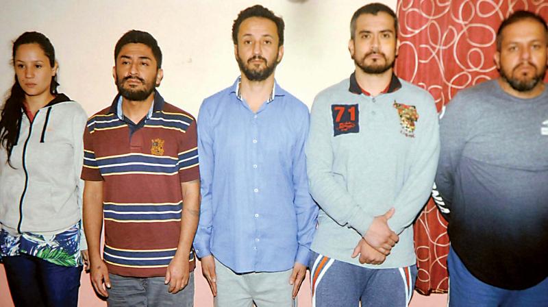 (From left) Kimberly, Edward, Gustavo, Edwardo and Yair were arrested by city police for theft cases in Bengaluru on Tuesday (Photo: KPN)