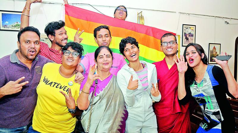 LGBT rights activists celebrate the Supreme Court ruling that legalised same sex relationships at Lamakaan in Hyderabad on Thursday. 	(Image: Deepak Deshpande)