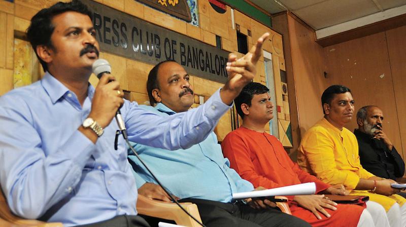 Advocates along with Sanatan Sanstha addressing a press meet in Bengaluru on Thursday 	(Photo:DC)