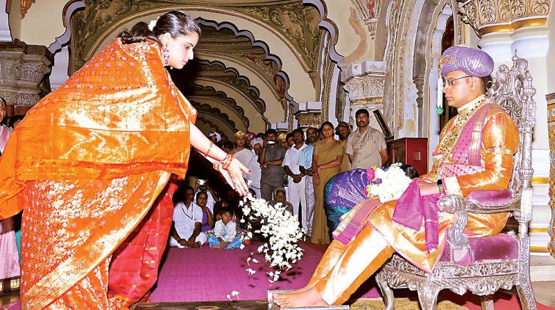 Mysuru scion Yaduveer Krishnadatta Chamaraja Wadiyar and his wife Trishika Kumari Devi perform rituals before the start of private Dasara celebrations at the Mysuru Palace (Photo: KPN)