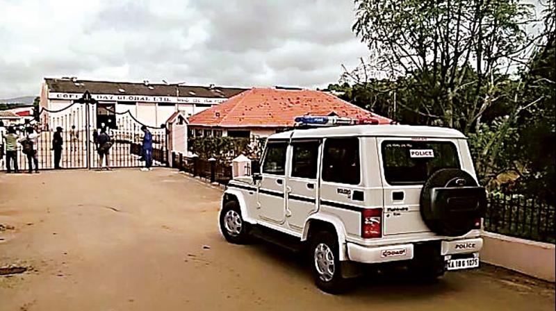 Income tax officers conducting raids at V.G. Siddhartha office in Chikkam- agaluru on Thursday 	(Photo:DC)