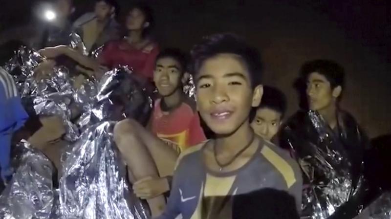 Authorities in northern Chiang Rai province began the dangerous mission to bring out the 12 boys and their coach earlier on Sunday. (Photo: File/AP)