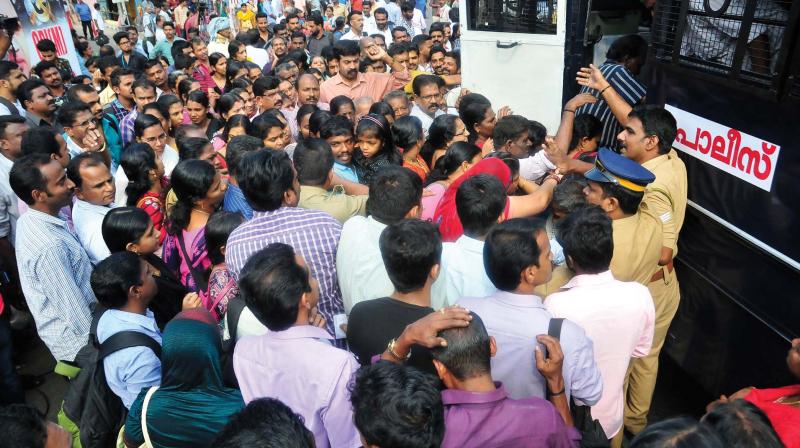 Police vans take passengers in front of Central Railway Station due to the motor vehicle bandh called by major trade unions against increase in price of diesel and petrol, in Thiruvananthapuram on Wednesday. (Photo: A.V. MUZAFAR)