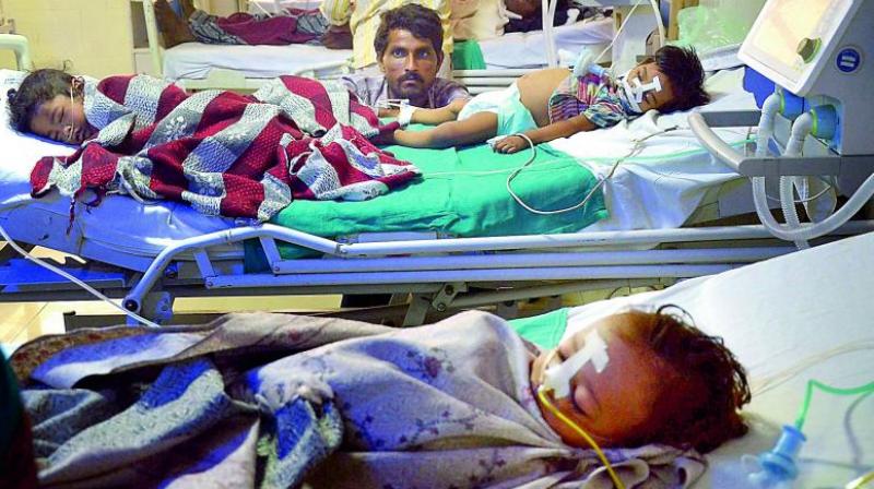 Children admitted in the state-run Baba Raghav Das Medical College in Gorakhpur. (Photo; PTI | File)