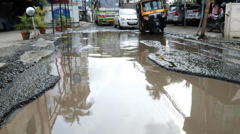 The huge crater formed at St Benedict road near North railway station in Kochi following heavy rains. (file pic)