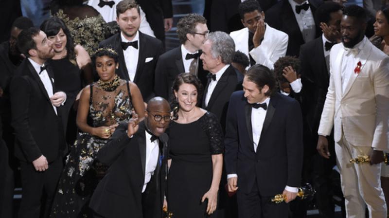 The team of Moonlight receiving their Best Picture award.