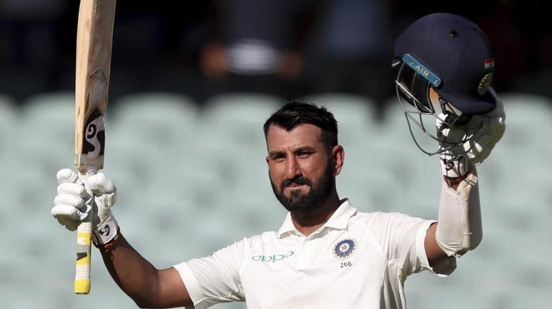 Irrepressible Cheteshwar Pujara stroked his third century of the summer Thursday to steer India into a commanding position on Day one of the fourth and final Test against Australia in Sydney. (Photo: AP)