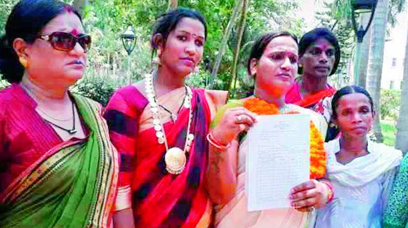 Meghna Sahoo (third from left) with her nomination paper outside Odisha Legislative Assembly.