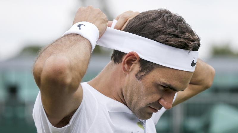 Roger Federer will be looking to become the sole leader in terms of the number of Wimbledon mens singles titles won. (Photo: AP)