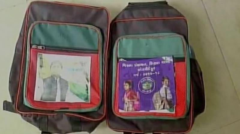 The bags were apparently manufactured for distribution in Uttar Pradesh when the Samajwadi Party was in power. (Photo: ANI/Twitter)