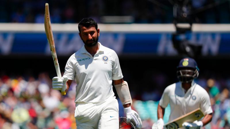 Cheteshwar Pujara has gained a spot to be third in the latest ICC batsmen rankings, following his man of the series performance in Indias maiden Test series win in Australia. (Photo: AFP)