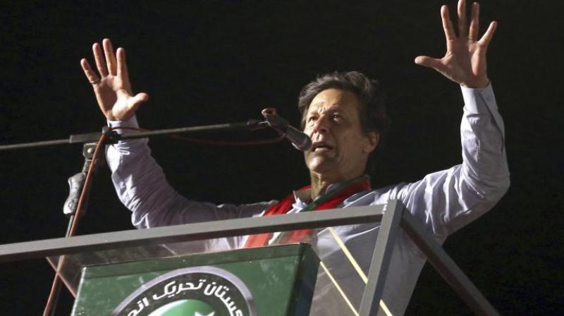It was Khans last election rally in Karachi before the elections as he contests from an important constituency of the city for a national assembly seat. (Photo: AP)